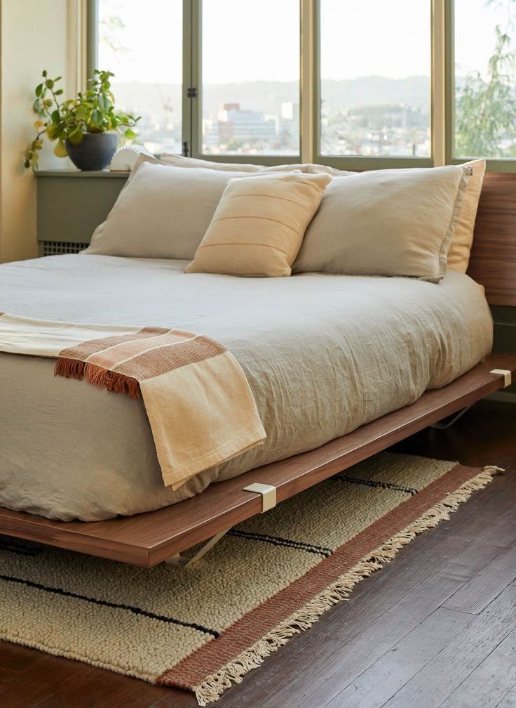 29 Stylish Bed Frame Ideas That'll Elevate Your Bedroom Instantly! - Minimalist Magic: Floating Bed Frame